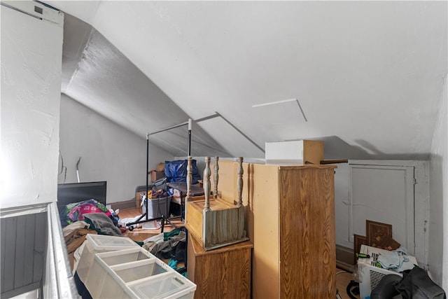 bonus room featuring vaulted ceiling