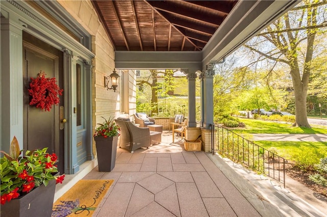 view of patio featuring a porch