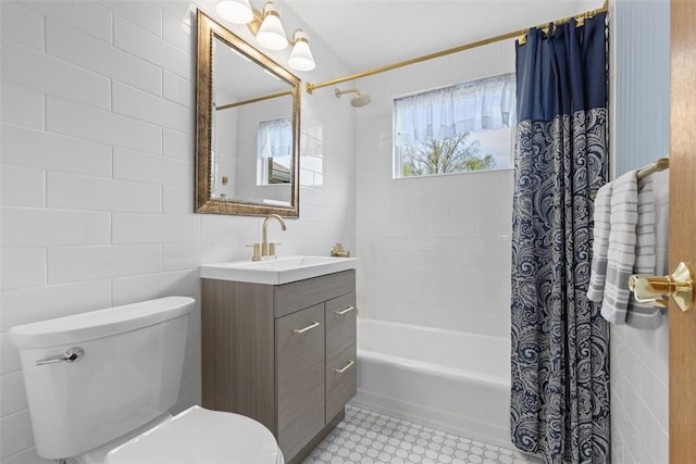 full bathroom featuring vanity, toilet, tile walls, and shower / bath combo with shower curtain