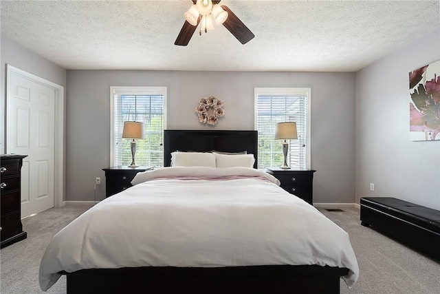 703 Freedom Dr, Collier Twp, PA 15106 - bedroom with baseboards, light carpet, and multiple windows