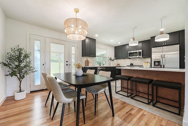 dining room featuring light wood finished floors