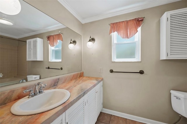full bathroom featuring crown molding, vanity, toilet, tile patterned floors, and baseboards