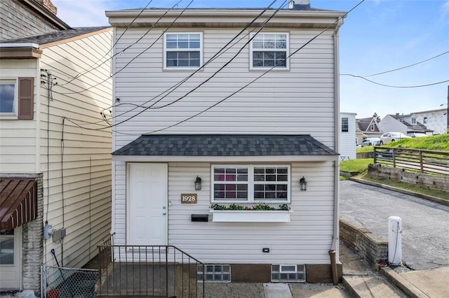 1928 Shamokin, South Side, PA 15203 - view of front of home with fence and a chimney