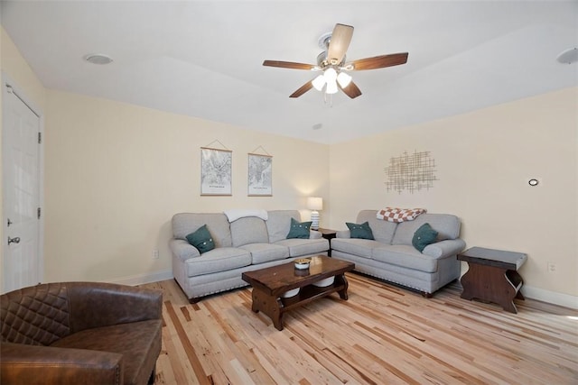 1928 Shamokin, South Side, PA 15203 - living room with baseboards, light wood-style flooring, and ceiling fan