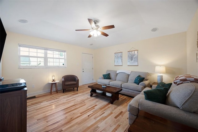 1928 Shamokin, South Side, PA 15203 - living area with baseboards, ceiling fan, and light wood-style flooring