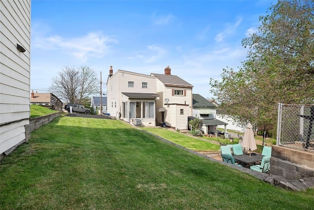 1928 Shamokin, South Side, PA 15203 - back of property with a chimney and a yard