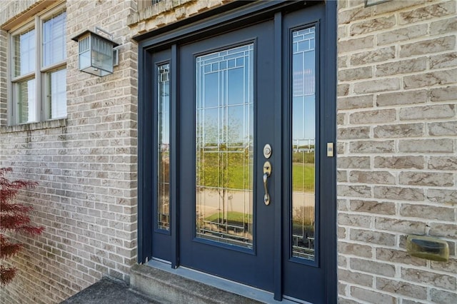 1043 Blackthorne Dr, Penn Twp Wml, PA 15644 - view of exterior entry with french doors and brick siding