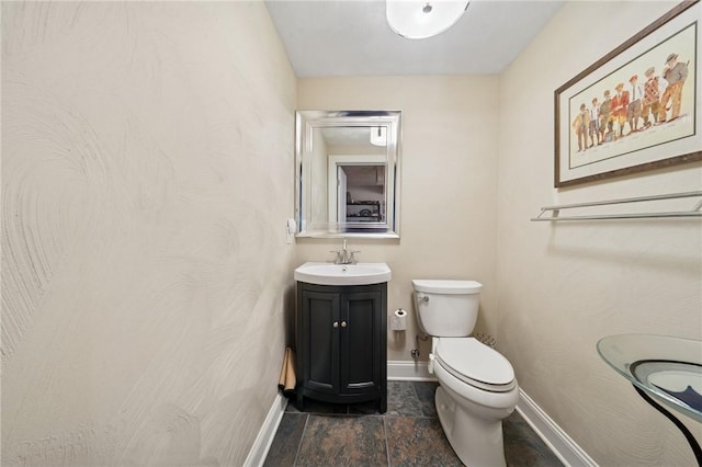 1043 Blackthorne Dr, Penn Twp Wml, PA 15644 - half bathroom featuring toilet, baseboards, and vanity