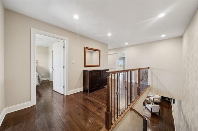 1043 Blackthorne Dr, Penn Twp Wml, PA 15644 - corridor with recessed lighting, baseboards, an upstairs landing, and dark wood-type flooring