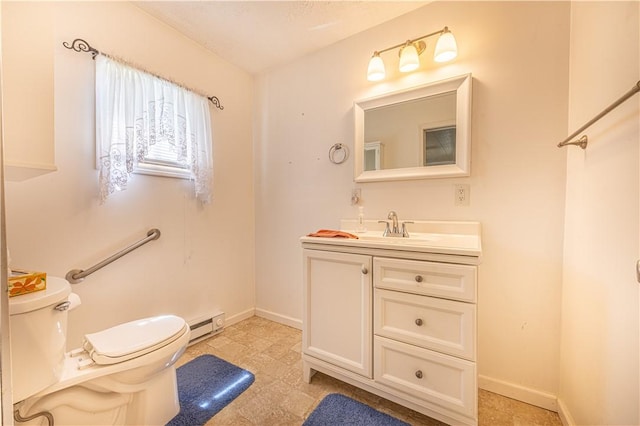 14 Cedar St, Masontown, PA 15461 - bathroom featuring baseboards, a baseboard radiator, vanity, and toilet