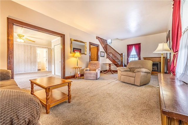 14 Cedar St, Masontown, PA 15461 - living area featuring carpet floors, stairway, and a fireplace