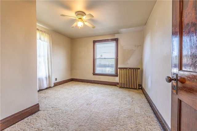14 Cedar St, Masontown, PA 15461 - unfurnished room with carpet floors, plenty of natural light, radiator heating unit, and ceiling fan