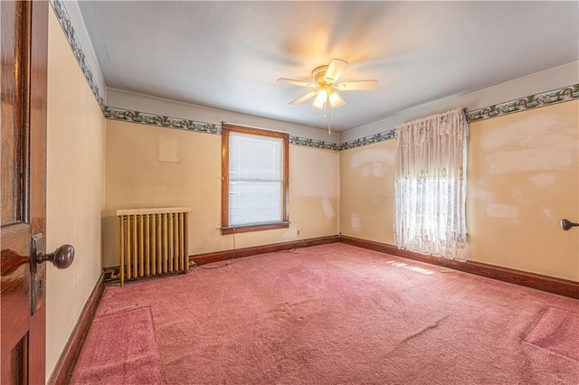 14 Cedar St, Masontown, PA 15461 - spare room featuring a ceiling fan, baseboards, radiator heating unit, and carpet