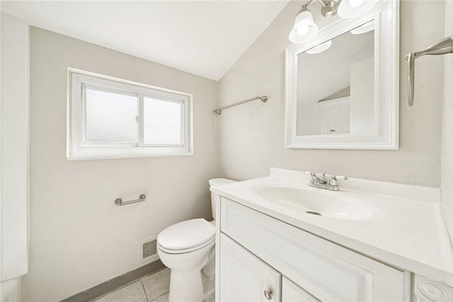 bathroom with vanity, tile patterned flooring, toilet, and visible vents