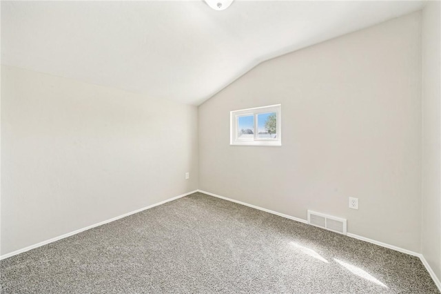 bonus room featuring visible vents, baseboards, carpet floors, and lofted ceiling