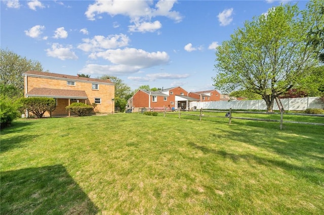 view of yard featuring fence