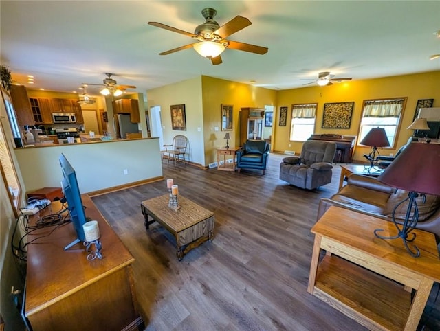 91 Green Manor Dr, Summit Twp But, PA 16002 - living room featuring baseboards, ceiling fan, and wood finished floors