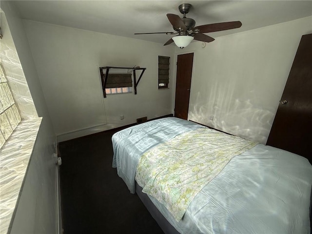 bedroom featuring ceiling fan