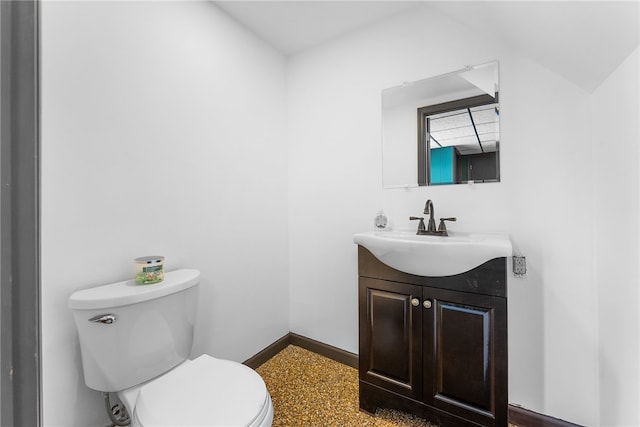 935 Broglie, South Park, PA 15236 - half bathroom featuring baseboards, vanity, toilet, and speckled floor