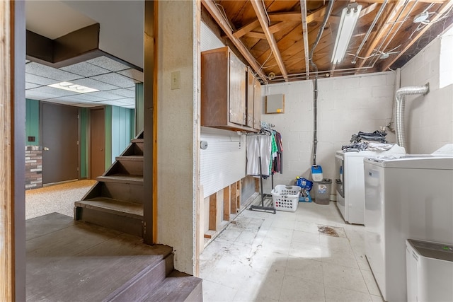 935 Broglie, South Park, PA 15236 - basement with concrete block wall, stairs, and washer and clothes dryer