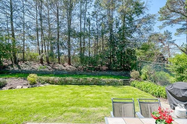 view of yard featuring fence