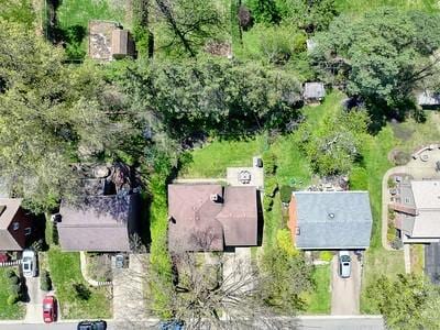 birds eye view of property with a residential view