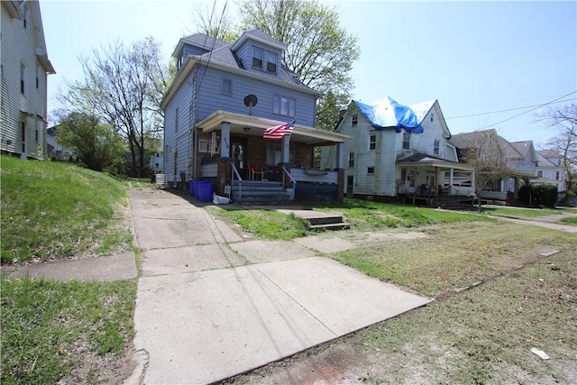 traditional style home featuring a porch