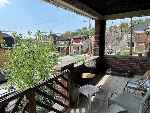 balcony featuring a residential view