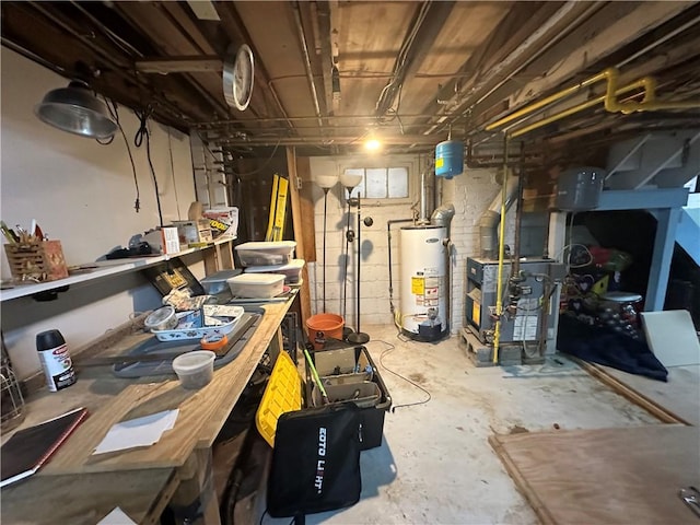 unfinished below grade area featuring a heating unit, gas water heater, and a workshop area