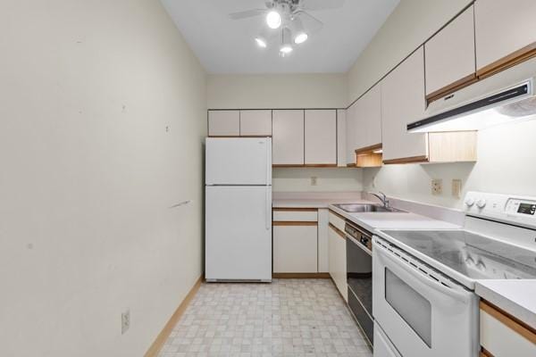 kitchen with a ceiling fan, a sink, light countertops, under cabinet range hood, and white appliances