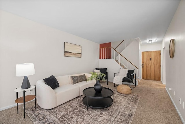 307 S Dithridge Unit 208, Oakland, PA 15213 - living area with carpet, stairs, and baseboards