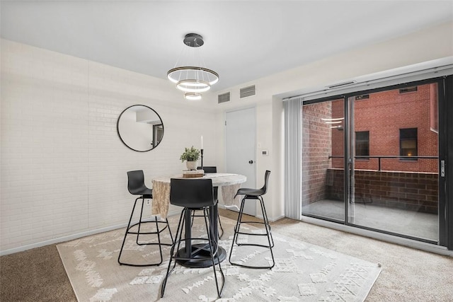 307 S Dithridge Unit 208, Oakland, PA 15213 - dining space with light carpet and baseboards