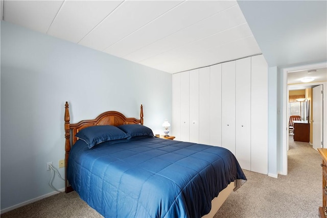 bedroom with a closet and carpet