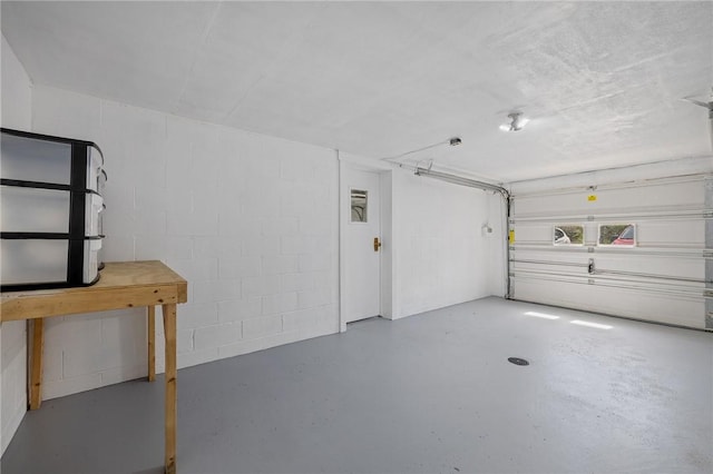 garage featuring concrete block wall