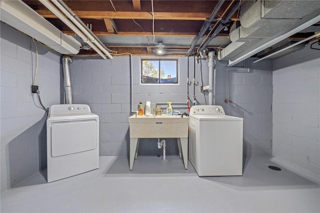 washroom with laundry area and washer and dryer