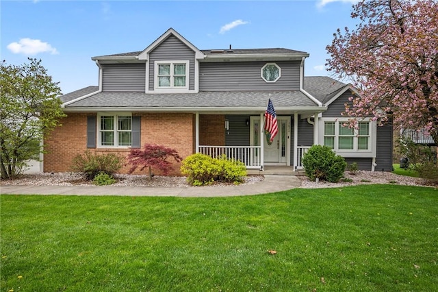 7024 Franklin Rd, Cranberry Twp, PA 16046 - traditional-style home with a porch, a front lawn, roof with shingles, and brick siding