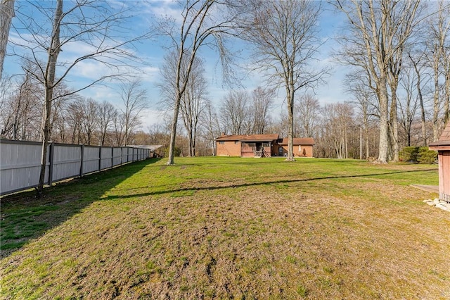 view of yard featuring fence