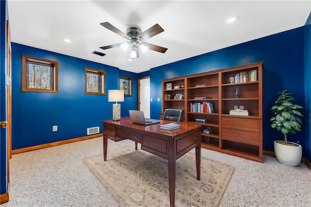 office with a ceiling fan, visible vents, speckled floor, baseboards, and recessed lighting