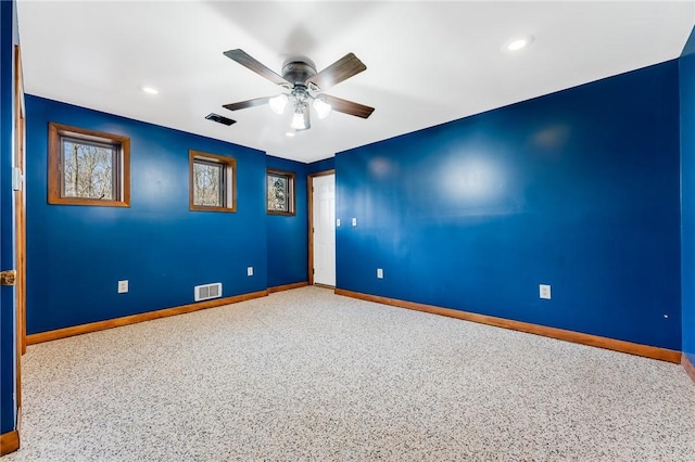 spare room featuring baseboards, a ceiling fan, recessed lighting, and visible vents
