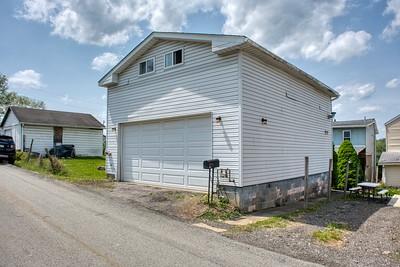 607 12th St, Elizabeth Twp/Boro, PA 15037 - view of side of home with an attached garage