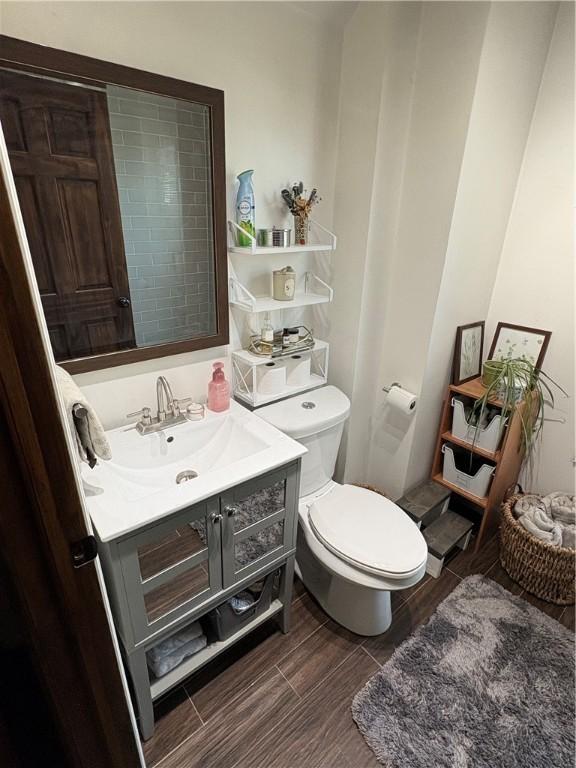 315 Taylor Ave, Bellevue, PA 15202 - half bath with toilet, wood tiled floor, and vanity