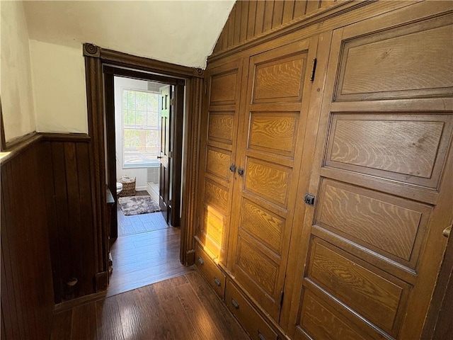 315 Taylor Ave, Bellevue, PA 15202 - hallway featuring vaulted ceiling, a wainscoted wall, and dark wood-type flooring