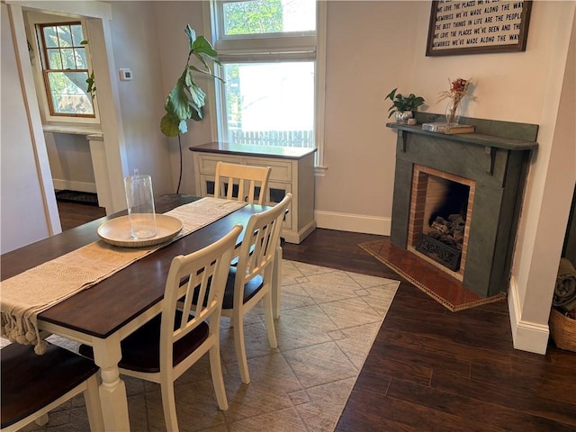 315 Taylor Ave, Bellevue, PA 15202 - dining space with baseboards, a wealth of natural light, and wood finished floors