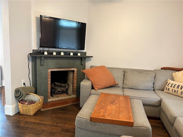 315 Taylor Ave, Bellevue, PA 15202 - living room featuring baseboards, wood finished floors, and a fireplace