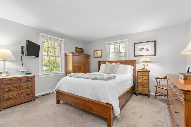 5983 Daleview Dr, Bethel Park, PA 15102 - bedroom featuring baseboards, visible vents, and light carpet