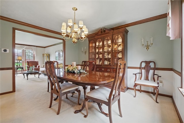 1058 Rimrock Rd, City Of Greensburg, PA 15601 - dining space featuring baseboards, ornamental molding, a chandelier, and light carpet