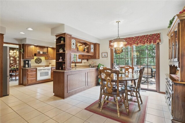 1058 Rimrock Rd, City Of Greensburg, PA 15601 - dining room featuring recessed lighting, an inviting chandelier, and light tile patterned floors