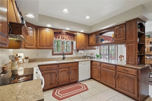 1058 Rimrock Rd, City Of Greensburg, PA 15601 - kitchen featuring brown cabinetry, electric range, white dishwasher, a sink, and recessed lighting