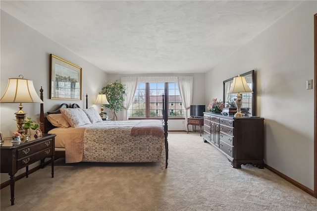 1058 Rimrock Rd, City Of Greensburg, PA 15601 - bedroom featuring a textured ceiling, baseboards, and light carpet