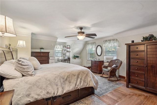 bedroom with ceiling fan and light wood finished floors